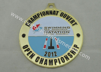 水泳のニューブランズウィックのエナメル メダル、金張り、両側の腐食